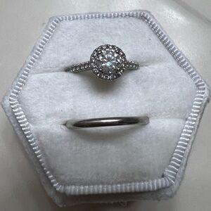 Platinum halo engagement ring and wedding band